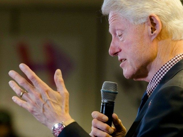 Former President Bill Clinton speaks as he campaigns for his wife, Democratic presidential