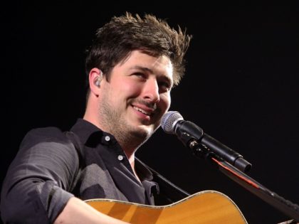 Marcus Mumford with Mumford & Sons perform at the Infinite Energy Arena on Monday, Apr