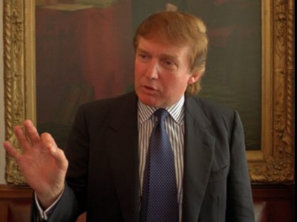 Donald Trump speaks to a reporter at the New York Court of Appeals while awaiting argument