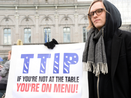 An activist during a demonstration against TTIP outside the European Parliament Getty