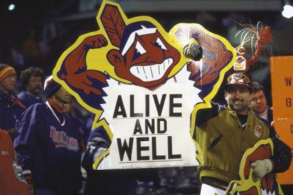 Baseball: World Series Game 4. View of Cleveland Indians fans in stands holding sign with Chief Wahoo logo that reads ALIVE AND WELL during game vs Florida Marlins at Jacobs Field. Game 4. Cleveland, OH 10/22/1997 CREDIT: Heinz Kluetmeier (Photo by Heinz Kluetmeier /Sports Illustrated/Getty Images) (Set Number: X53812 )