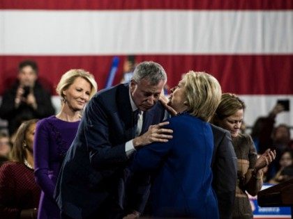 Democratic Presidential Candidate Hillary Clinton speaks with New York City Mayor Bill de