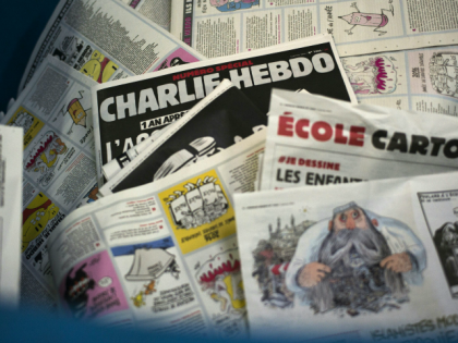 A picture taken on January 4, 2016 at a printing house near Paris shows the cover of the l