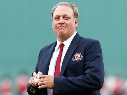 Former Boston Red Sox pitcher Curt Schilling #38 throws out the first pitch after being in