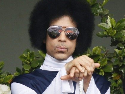 US singer Prince attends the French tennis Open round of sixteen match between Spain'