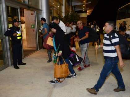 Cuban immigrants arrive January 12, 2016 at the airport of the Costa Rican city of Liberia
