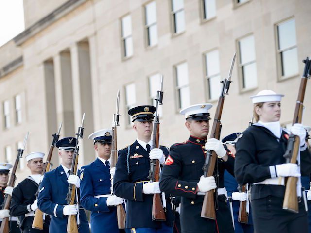 Honor guard arrive for an honor cordon with US Secretary of Defense Ashton Carter and Germany's Minister of Defense Ursula von der Leyen at the Pentagon March 8, 2016 in Washington, DC. / AFP / Brendan Smialowski (Photo credit should read BRENDAN SMIALOWSKI/AFP/Getty Images)