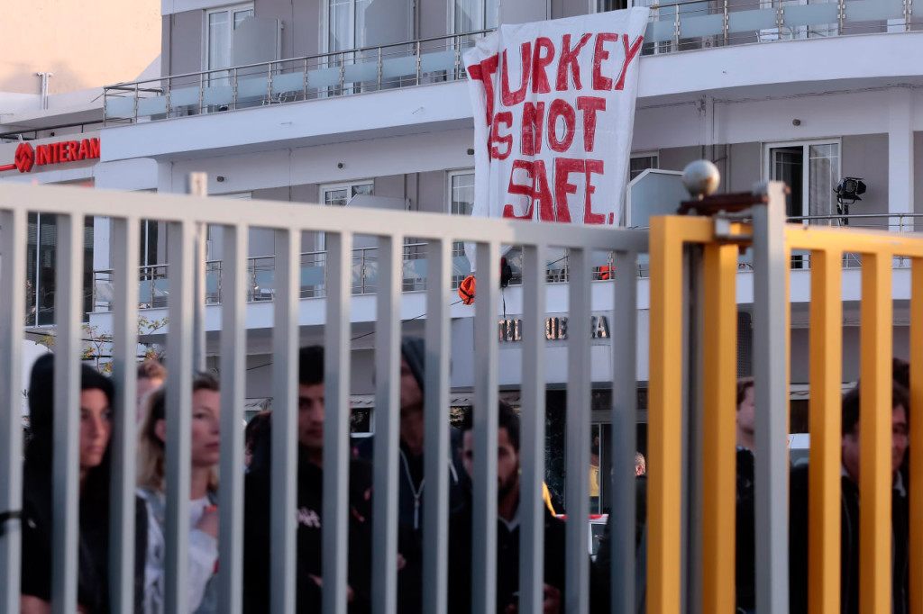 MYTILINI, GREECE - 4 APRIL: A banner "Turkey is not safe" hung by activist during a protest against deportation on 4 April in Mytilini on Lesvos island Greec during a first day of deportation after an agreement between EU and Turkey on refugees crisis.Some one hundret sixty migrants who refused to apply for asylum have been deported early morning.(Photo by Milos Bicanski/Getty Images) *** Local Caption***