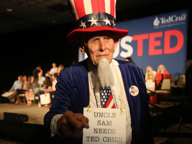 Don Erwin is dressed as Uncle Sam during a rally for Republican presidential candidate Ted