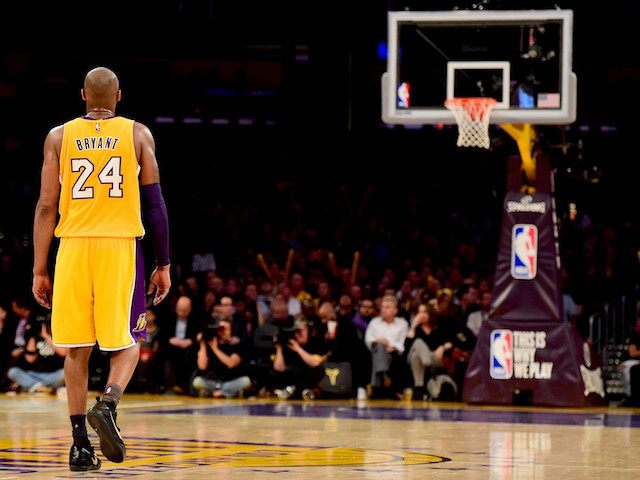 LOS ANGELES, CA - APRIL 13: Kobe Bryant #24 of the Los Angeles Lakers reacts while taking