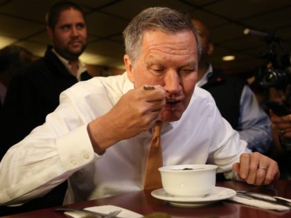 Republican presidential candidate John Kasich eats soup while having lunch at PJ Bernstein's Deli Restaurant on April 16, 2016 in New York City.