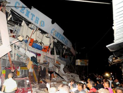 Rescue workers work to pull out survivors trapped in a collapsed building after a huge earthquake struck, in the city of Manta early on April 17, 2016. At least 41 people were killed when a powerful 7.8-magnitude earthquake struck Ecuador, destroying buildings and sending terrified residents dashing from their homes, …