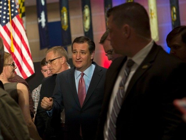Republican Presidential candidate Senator Ted Cruz (R-TX) shakes hands and poses for photo