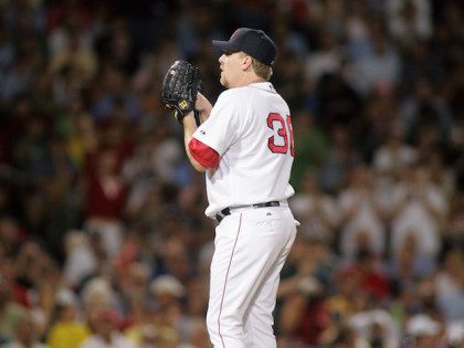 BOSTON, MA - JULY 14: Curt Schilling #38 of the Boston Red Sox pitches during the game wi