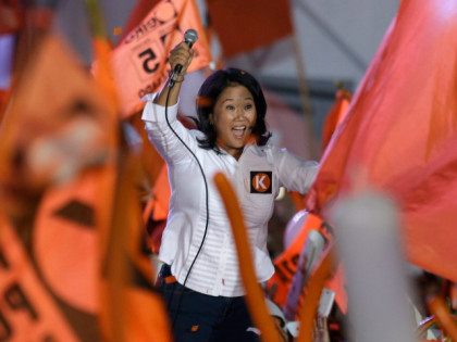 In this Thursday, April 7, 2016 photo, presidential candidate Keiko Fujimori waves at supp