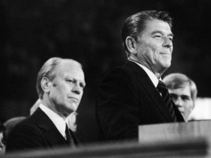 American president Gerald Ford (left) listens as future American president Ronald Reagan (1911 - 2004) delivers a speech during the closing session of the Republican National Convention, Kansas City, Missouri, August 19, 1976.