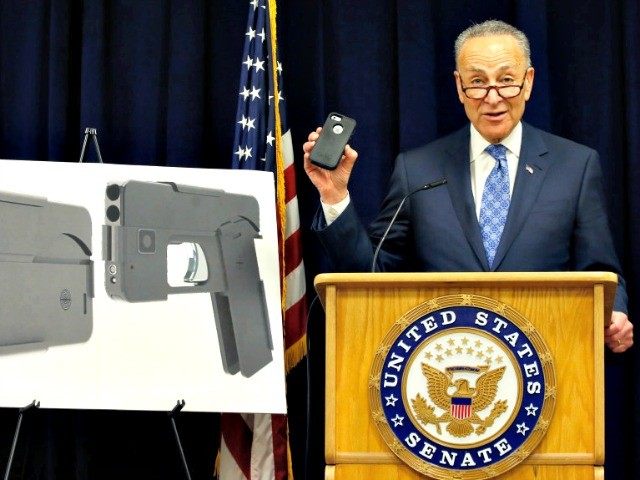 Standing beside photographs of a new product, U.S. Sen Charles Schumer, (D-New York), show