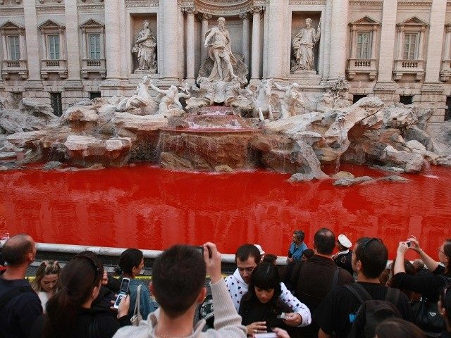 A red liquid was poured into the Trevi fountain in the center of Rome, 19 October 2007. A