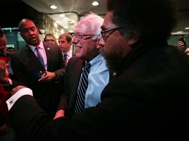 Philosopher Cornel West (R) greets Democratic presidential candidate Sen. Bernie Sanders (