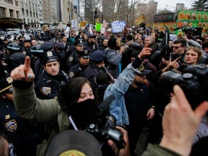 People clash with protesters while they take part in a march against Republican presidenti