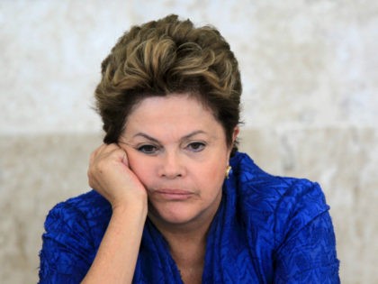 Brazil’s President Dilma Rousseff attends the launching ceremony of sectoral plans for the mitigation of climate change at the meeting of the Brazilian Forum on Climate Change in Brasilia, June 5, 2013. REUTERS/Ueslei Marcelino