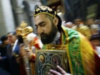 coptic easter A Coptic priest advances 04 April 2004 inside the Holy Sepulchre Church in Jerusalem on Palm Sunday as hundreds of followers of the different branches of Christianity began Easter celebrations by parading through Jerusalem's Old City before praying at the Church of the Holy Sepulchre, believed to be the final …