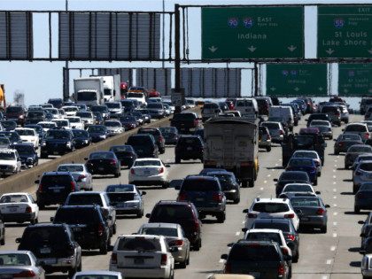 Illinois Might Tax Drivers per Mile -- FILE - In this May 24, 2013 file photo, traffic beg
