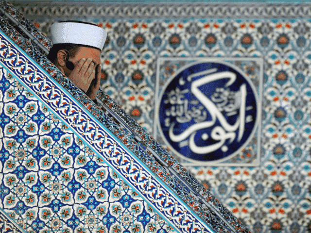 A muslim imam prays in the mosque in downtown Sofia on April 5, 2013. Bulgaria is hoping t