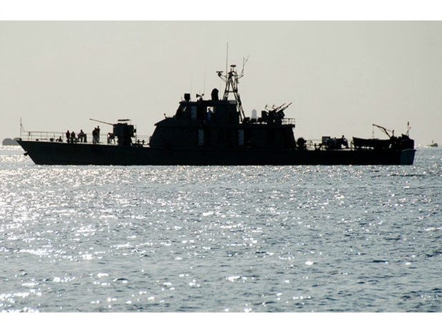 One of two Iranian navy warships arrives to dock at Port Sudan in the Red Sea state December 8, 2012. REUTERS/STRINGER