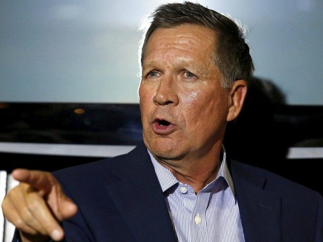 Republican Ohio Governor John Kasich gestures at a news conference in Washington July 7, 2