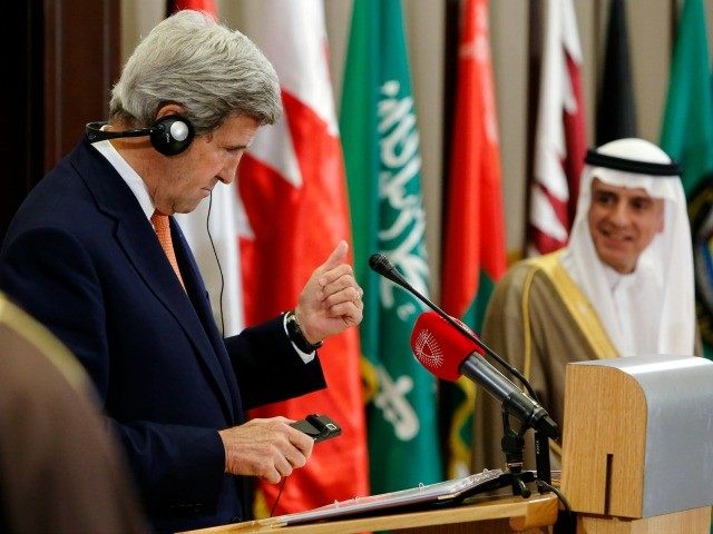 US Secretary of State, John Kerry (L) speaks near Saudi Arabia's Foreign Minister Ade