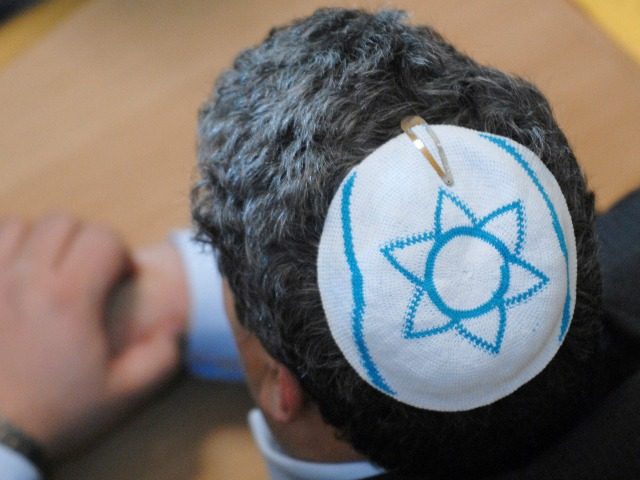 A member of the Jewish community, wearing a kippa, attends the inauguration of the new synagoge of Bochum, western Germany, also attended by the President of the Central Council of Jews in Germany Charlotte Knobloch and Northrhine-Westphalia State Premier Juergen Ruettgers, 16 December 2007.