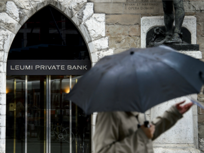 A sign of Leumi Private Bank is seen on June 14, 2013 in the financial district of Geneva.