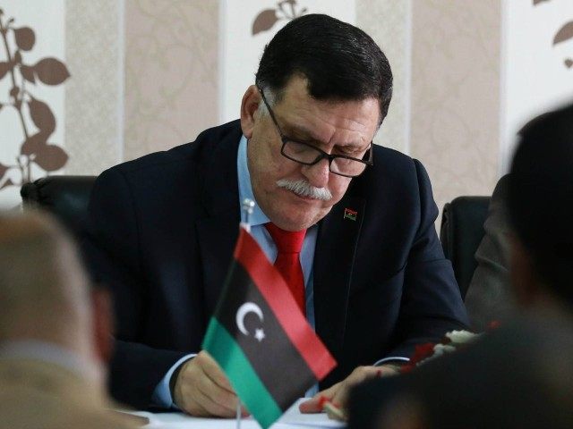 LIBYA, Tripoli : Libya's Prime minister-designate Fayez al-Sarraj chairs a Presidential Council of the Government of National Reconciliation meeting with local mayors inside the naval base in the Libyan capital Tripoli on April 3, 2016. / AFP / MAHMUD TURKIA