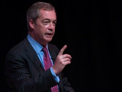 BASINGSTOKE, ENGLAND - NOVEMBER 16: The audience applauds as UKIP leader Nigel Farage add