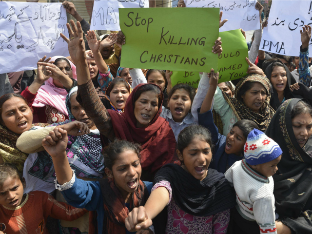 Pakistani Christians shout slogans during a protest in Lahore on March 16, 2015 against suicide bombing attacks on churches by Taliban militants.