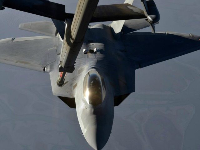 In this handout image provided by the U.S. Air Force, A KC-10 Extender refuels an F-22 Rap
