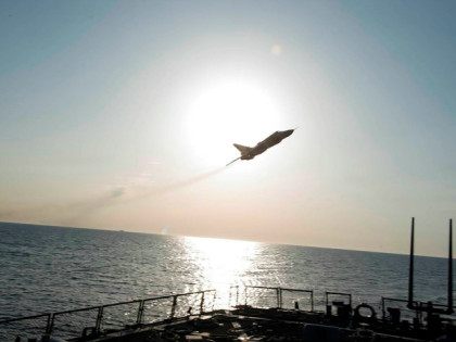 In this Tuesday, April 12, 2016 photo provided by the U.S. Navy, a Russian Sukhoi Su-24 attack aircraft makes a low altitude pass by the USS Donald Cook in the Baltic Sea. U.S. officials said the guided-missile destroyer was operating in international waters 70 nautical miles off the Russian enclave …