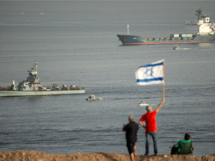 The Panamanian-flagged Klos-C is escorted into the southern Israeli port of Eilat by Israeli warships on March 8, 2014 after it was intercepted by the Israeli navy with the military saying it was carrying advanced rockets from Iran to Gaza.