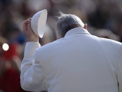 Pope Francis takes off his skullcalp during his weekly general audience on February 10, 2016 at St Peter's square in Vatican