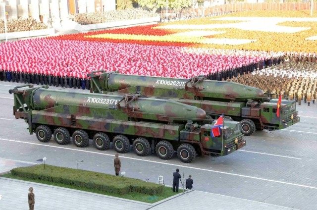 Missiles roll through Kim Il-Sung square in Pyongyang during a mass military parade in 201