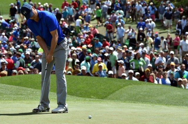 US golfer Jordan Spieth putts on the 7th hole during Round 2 of the 80th Masters Golf Tour