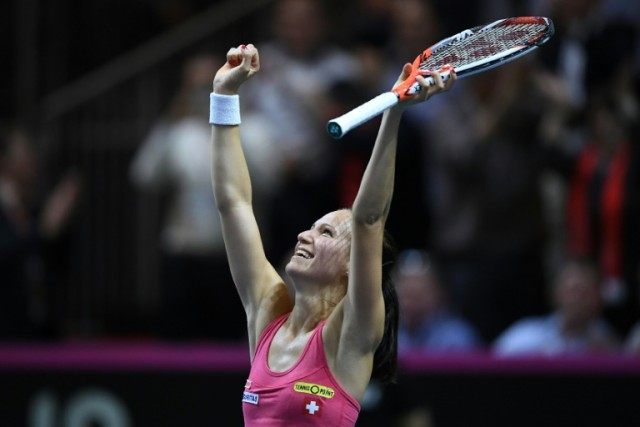 Swiss Viktorija Golubic celebrates at the end of the Fed Cup semi-final game between Switz