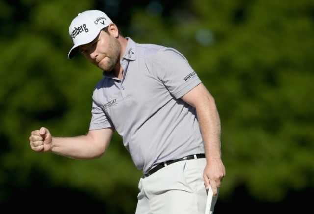 Branden Grace reacts to a putt on the 16th hole during the final round of the 2016 RBC Her