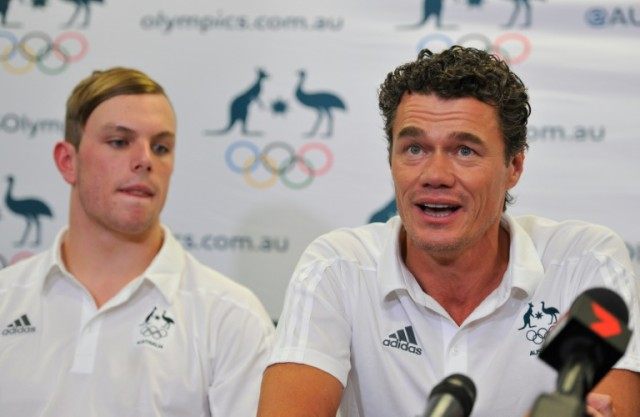 Kyle Chalmers (L) and Australian swimming coach Jacco Verhaeren attend a press conference