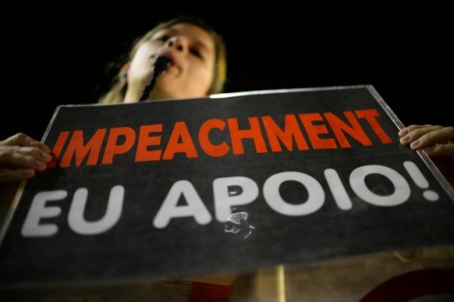 Activists supporting the impeachment of President Dilma Rousseff take part in a protest ne