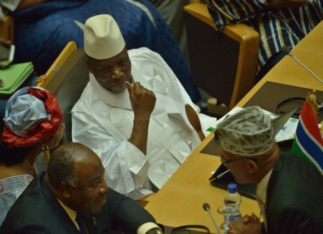 Gambia's President Yahya Jammeh (C) attends the 26th presidential summit of the African Un