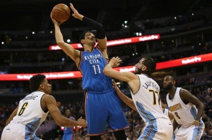 Oklahoma City Thunder's Enes Kanter takes a shot during the game against the Denver Nuggets at Pepsi Center on April 5, 2016
