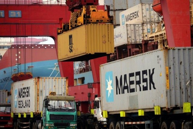 Chinese exports surged in March, the first gain in nine months, new figures show