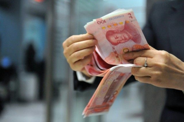 China’s central bank has cut its currency exchange rate against the dollar by the larges